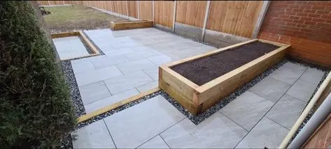a wooden bench sitting on top of a patio