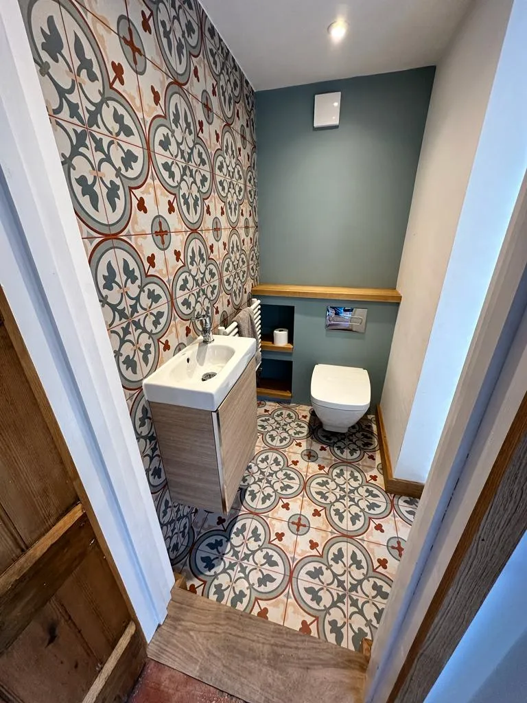 a bathroom with a toilet and a sink
