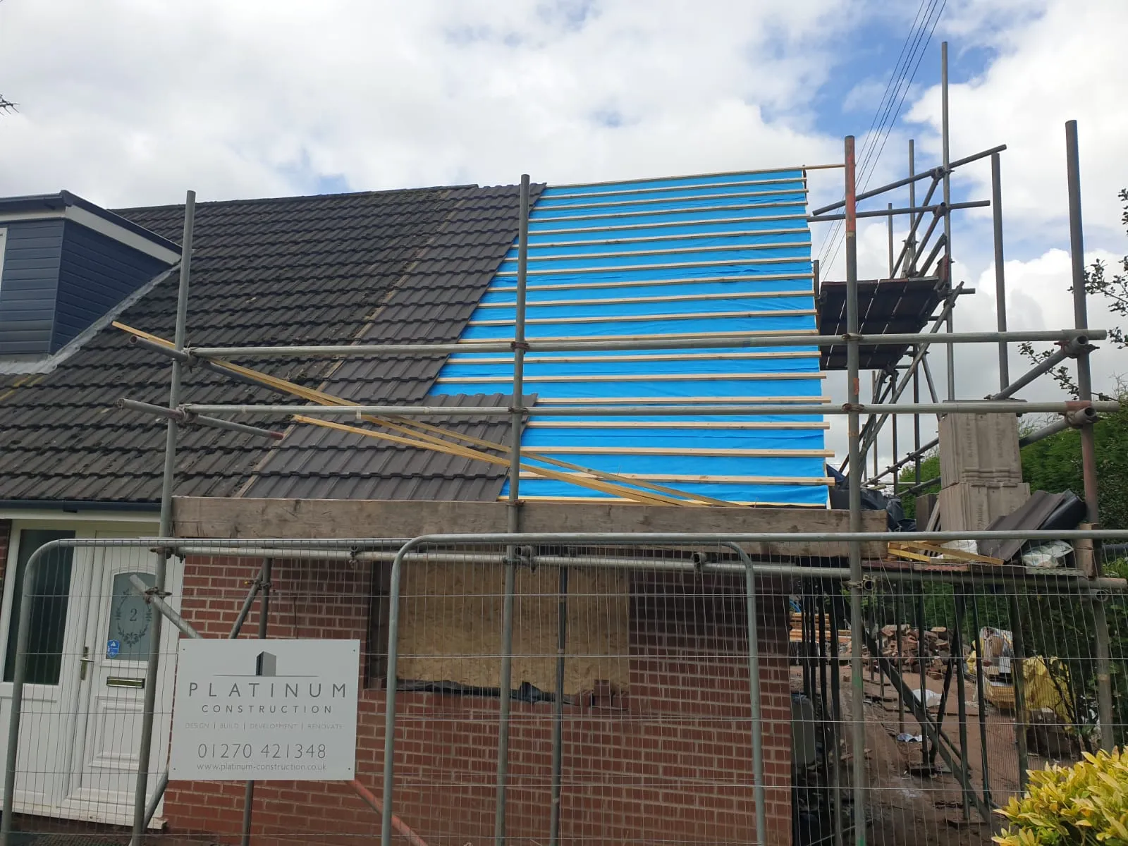 a house being built with scaffolding around it