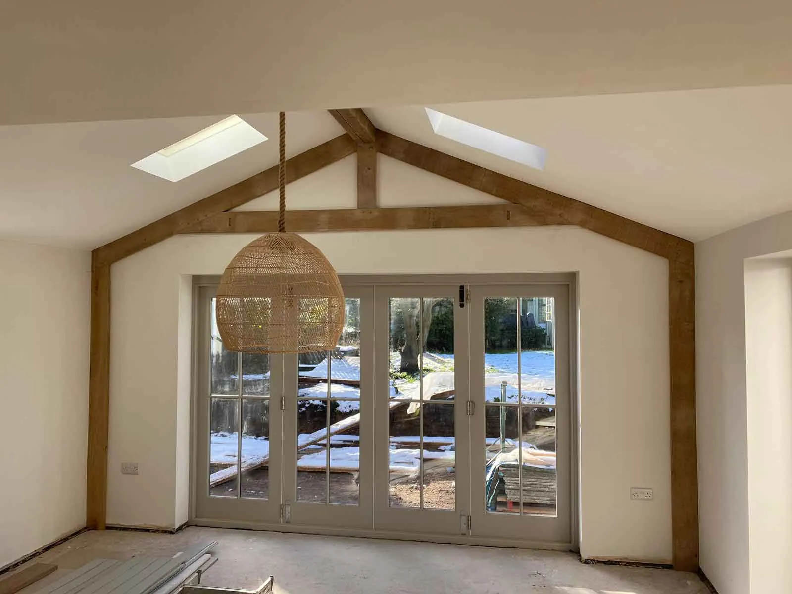 an empty room with a large glass door