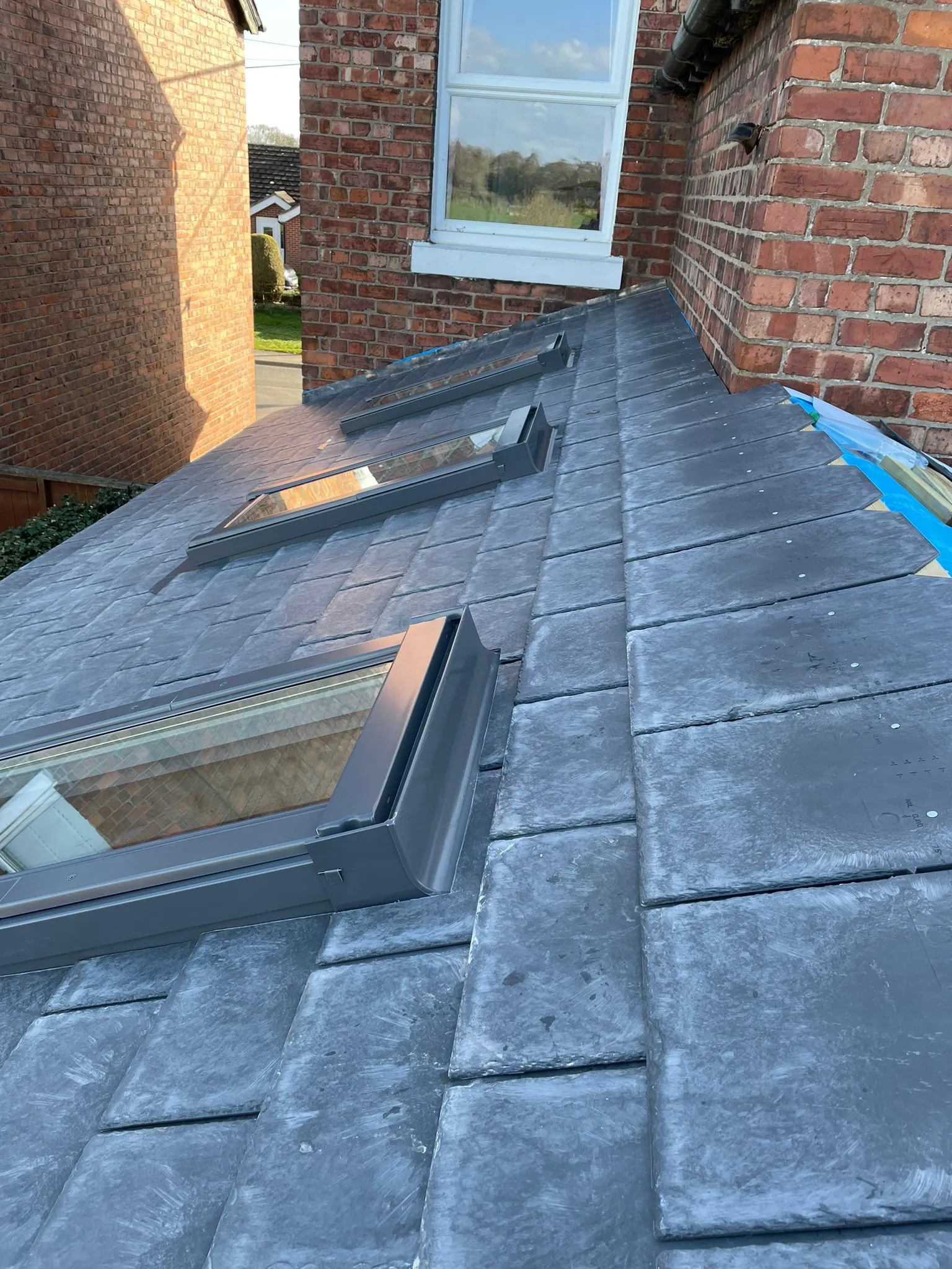 a flat roof with two windows on it