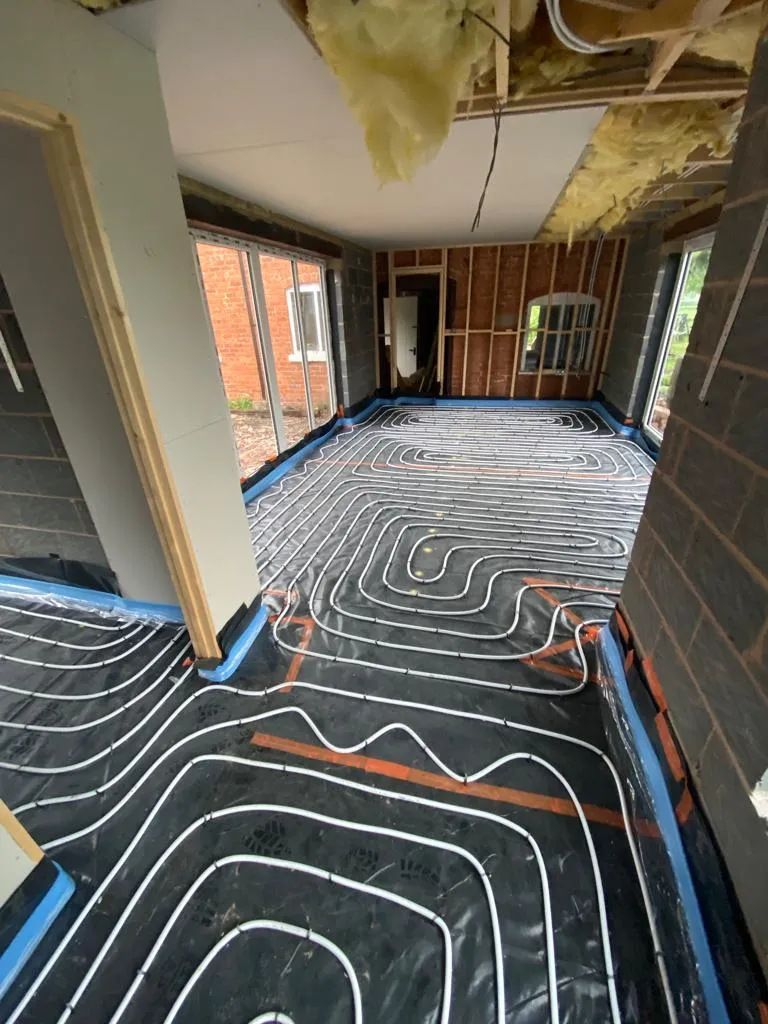 a room that has a lot of pipes in it