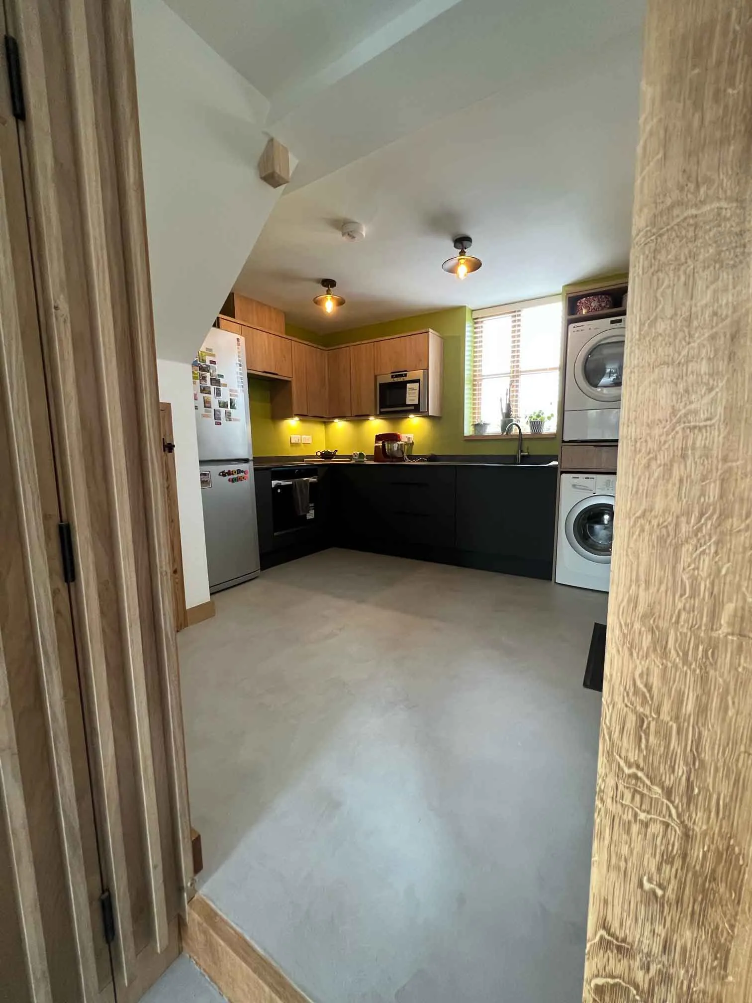 a kitchen with a stove top oven sitting inside of it