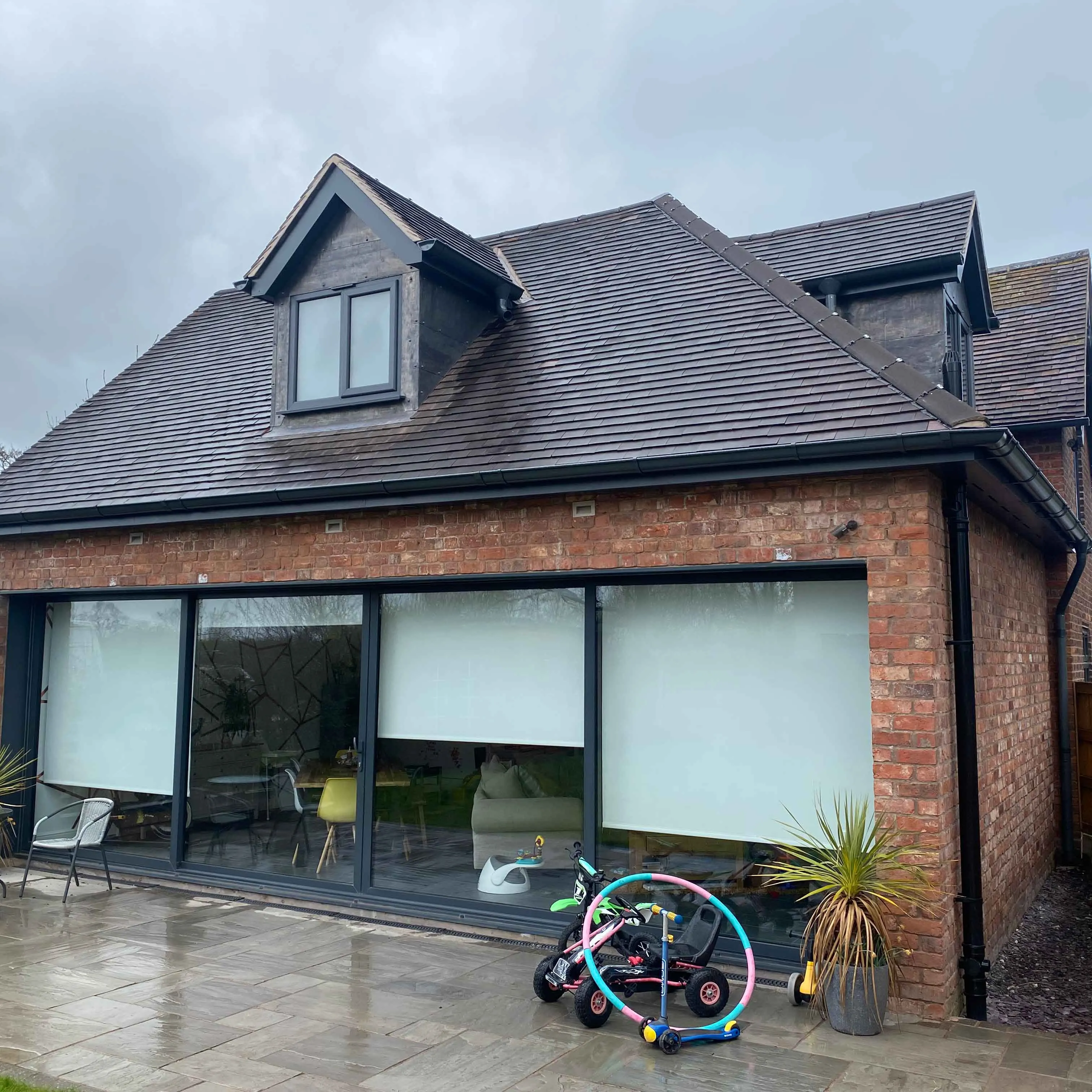 a house with a bicycle in front of it