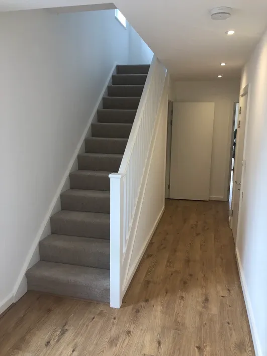 a staircase leading up to a second floor